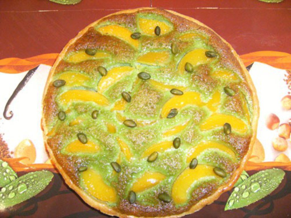 Crostata di pesche e pistacchi
