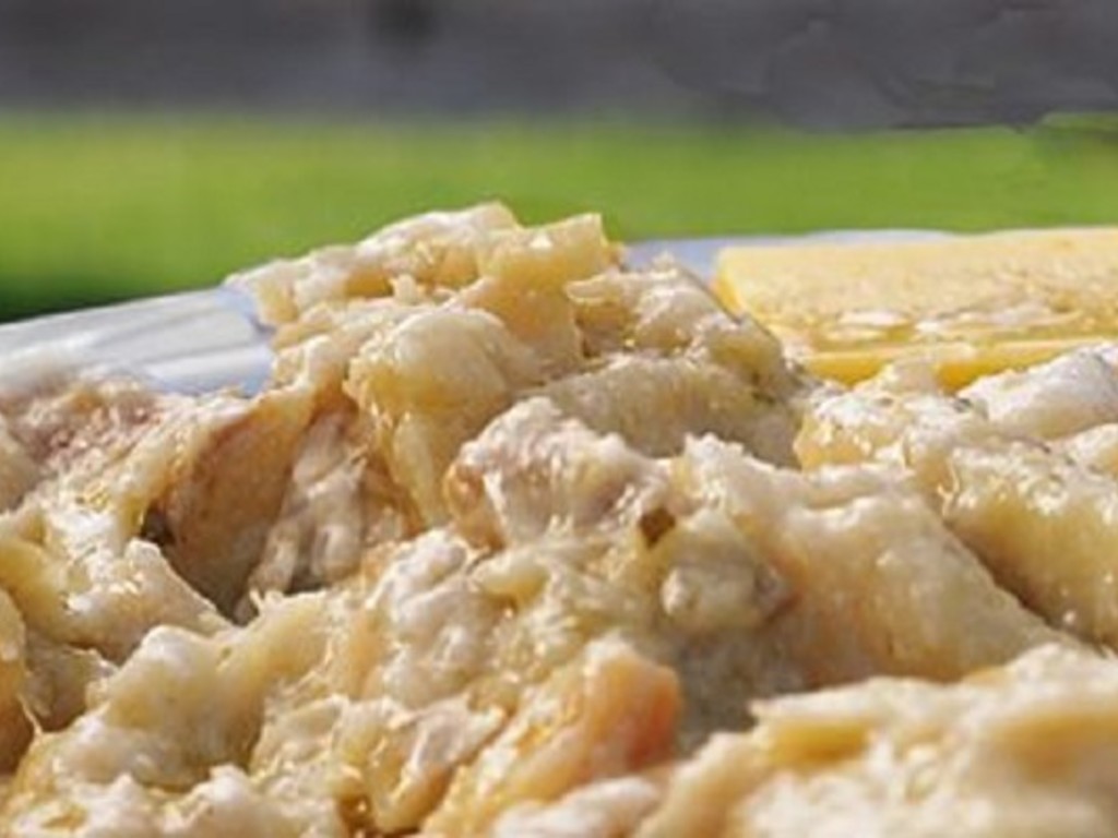 Baccalà al latte, cipolle e arancia