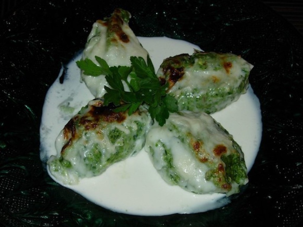 Malfatti gratinati con salsa alla fontina