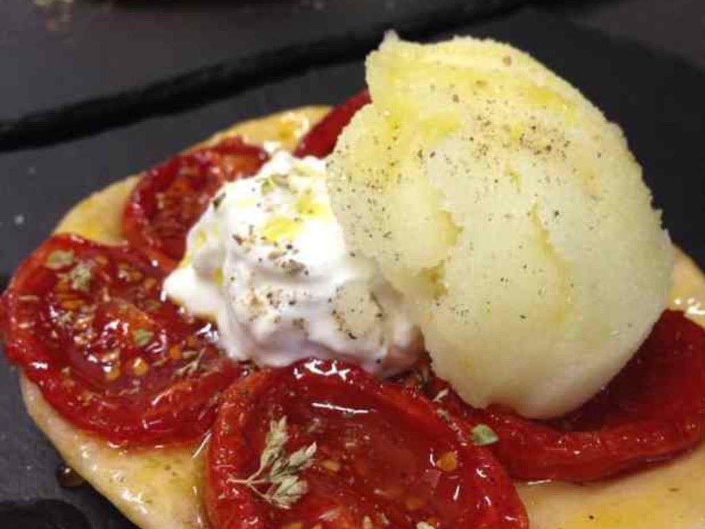 Tarte tatin di pomodori marinati all' origano, Burrata e sorbetto al limone