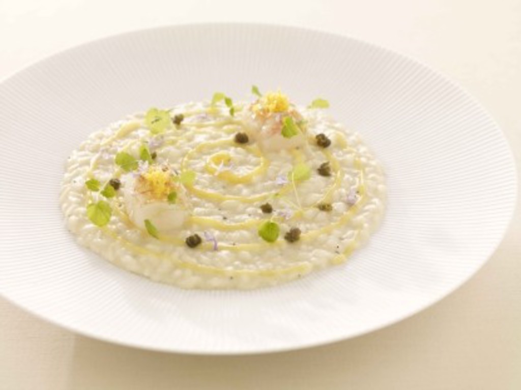Riso carnaroli, limone, capperi, scampi e rosmarino