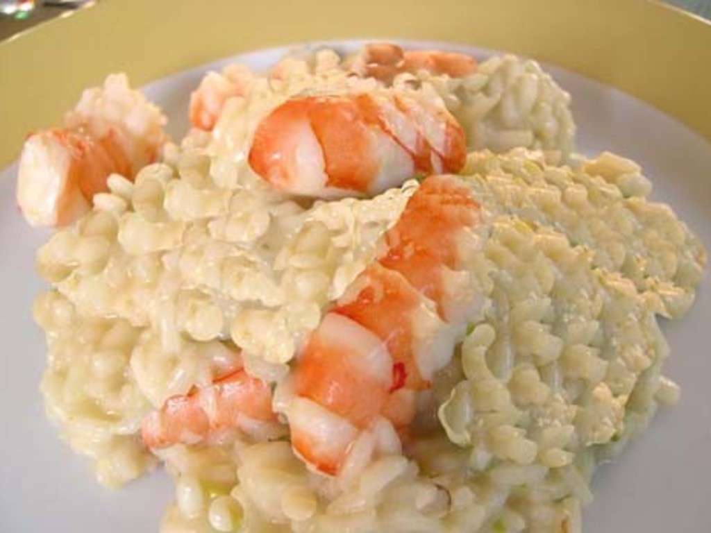 Risotto all' arancia con gamberi al vapore