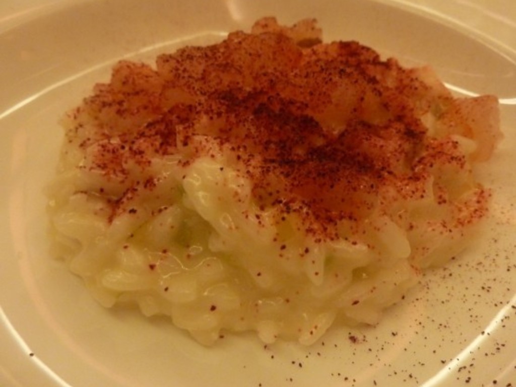 Risotto mantecato ai pomodori verdi, gamberi e pinoli tostati