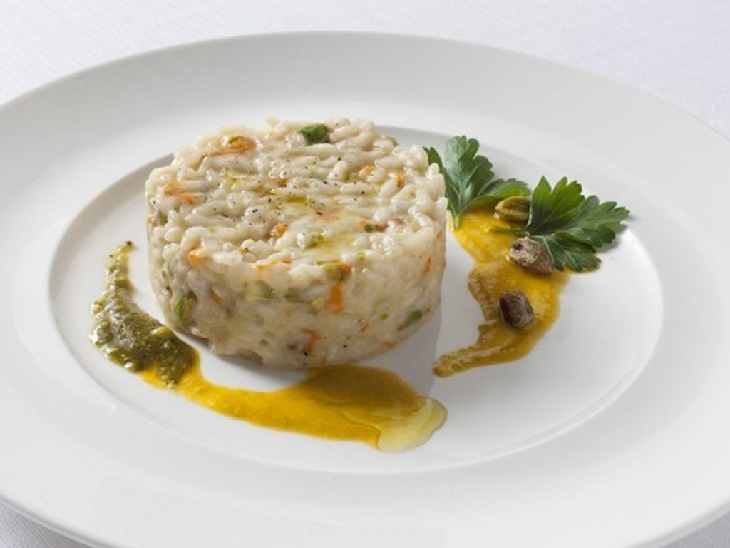 Risotto con fior di zucca e granella di pistacchi