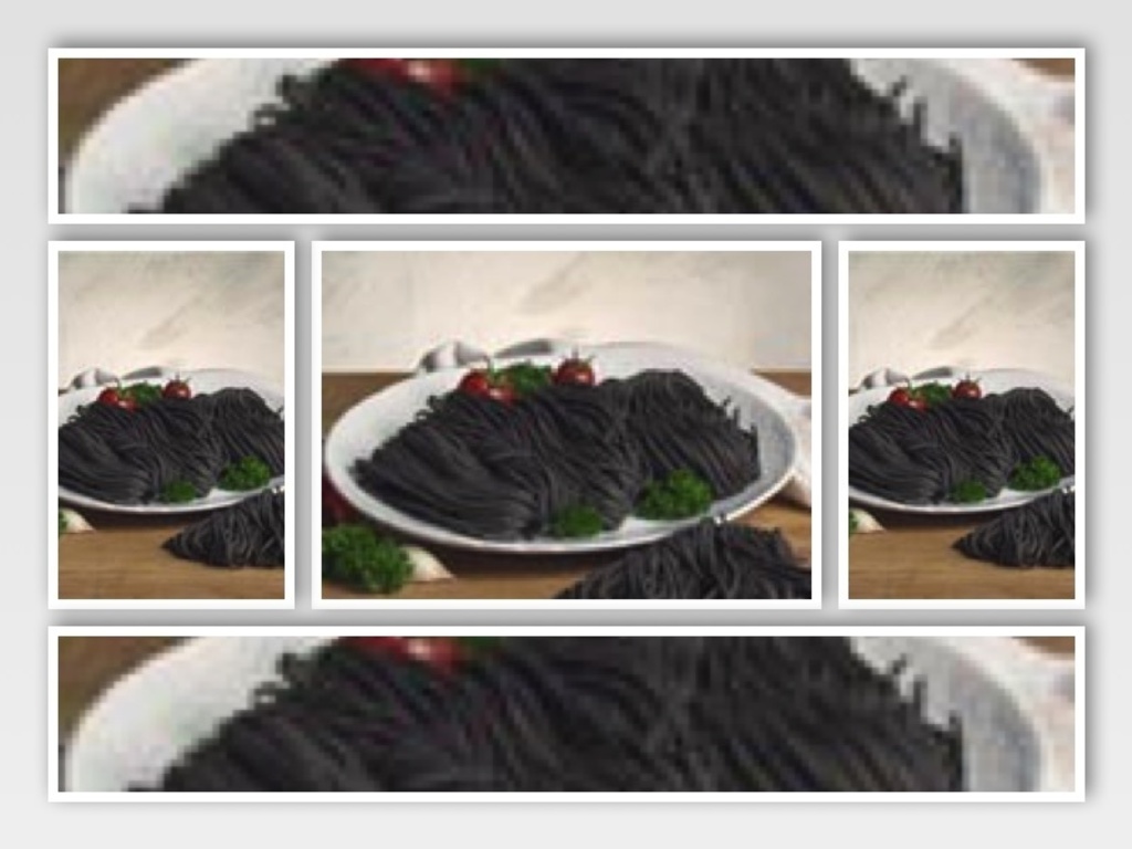 Tagliolini al nero di seppia con calamaretti e pomodorini