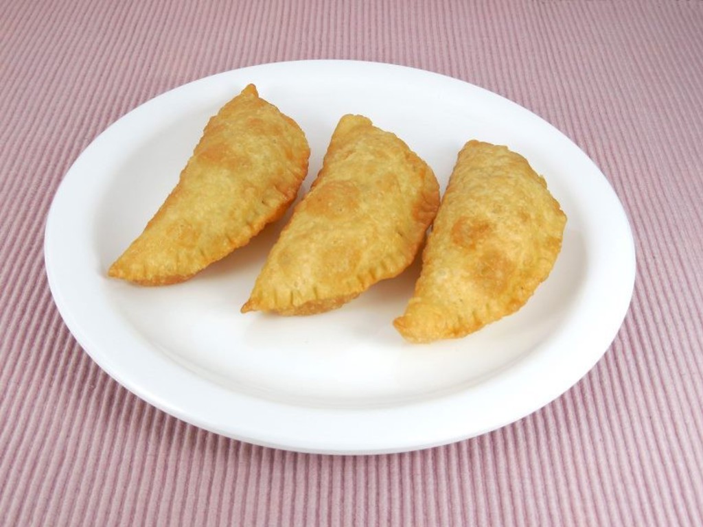 Mezzelune fritte di carne di maiale