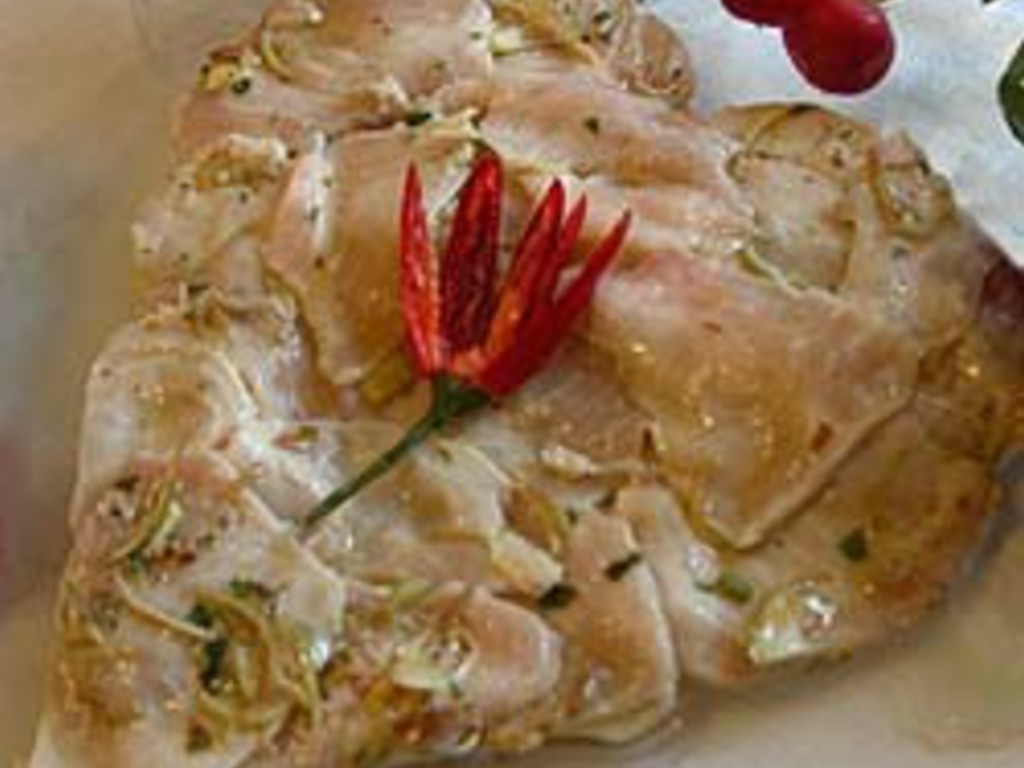 Carpaccio di spigola e carciofi