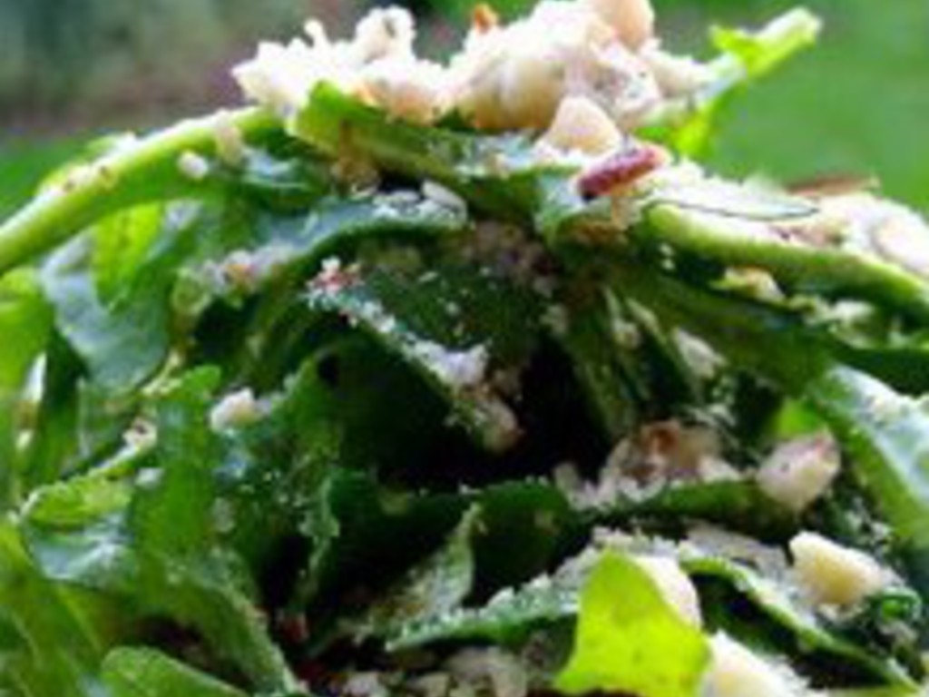 Insalata di rucola, cipolle rosse caramellate e pecorino