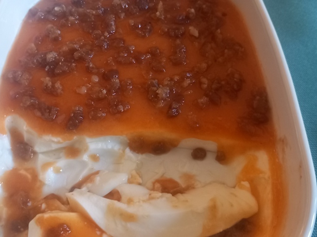 Panna cotta con coulis di cachi e marrons glacès